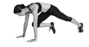 Runner showing the mountain climber exercise