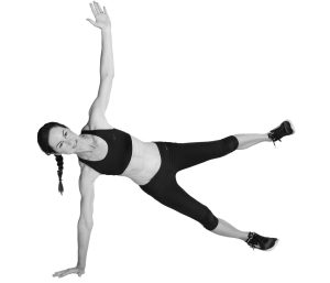 Runner showing the side plank with leg raise exercis